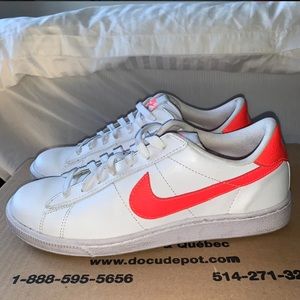 Neon coral Nike swoosh sneakers
